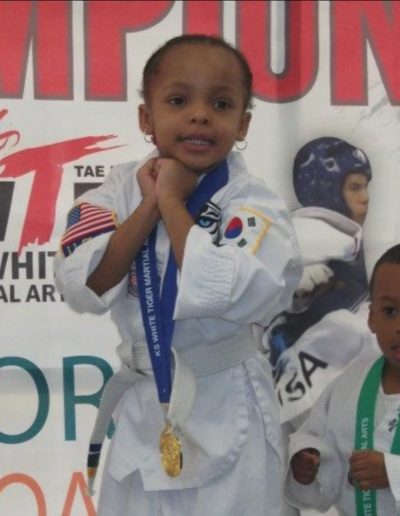 Sienna taking first place at her Karate tournament
